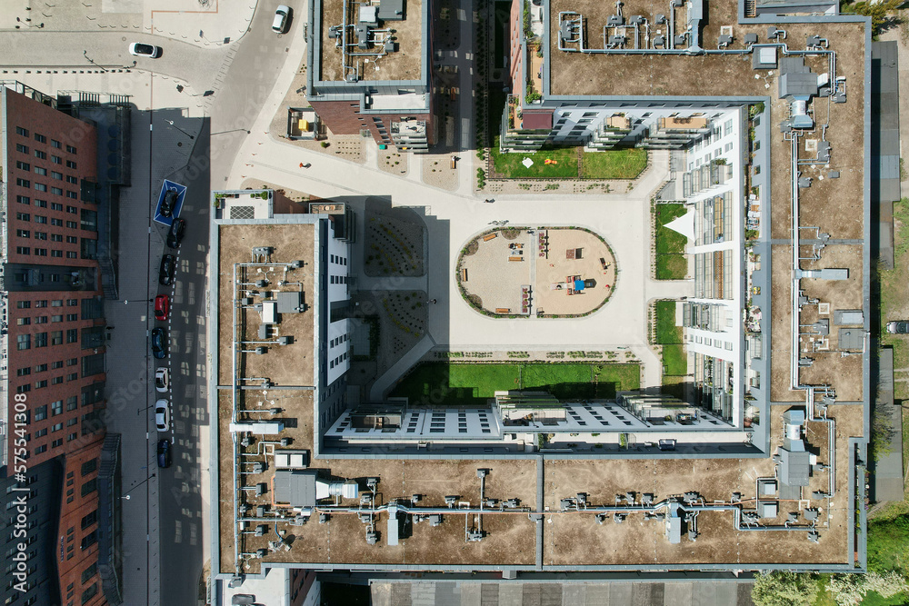 A modern housing estate on the site of an old brewery in Gdańsk, shown with a drone from the air