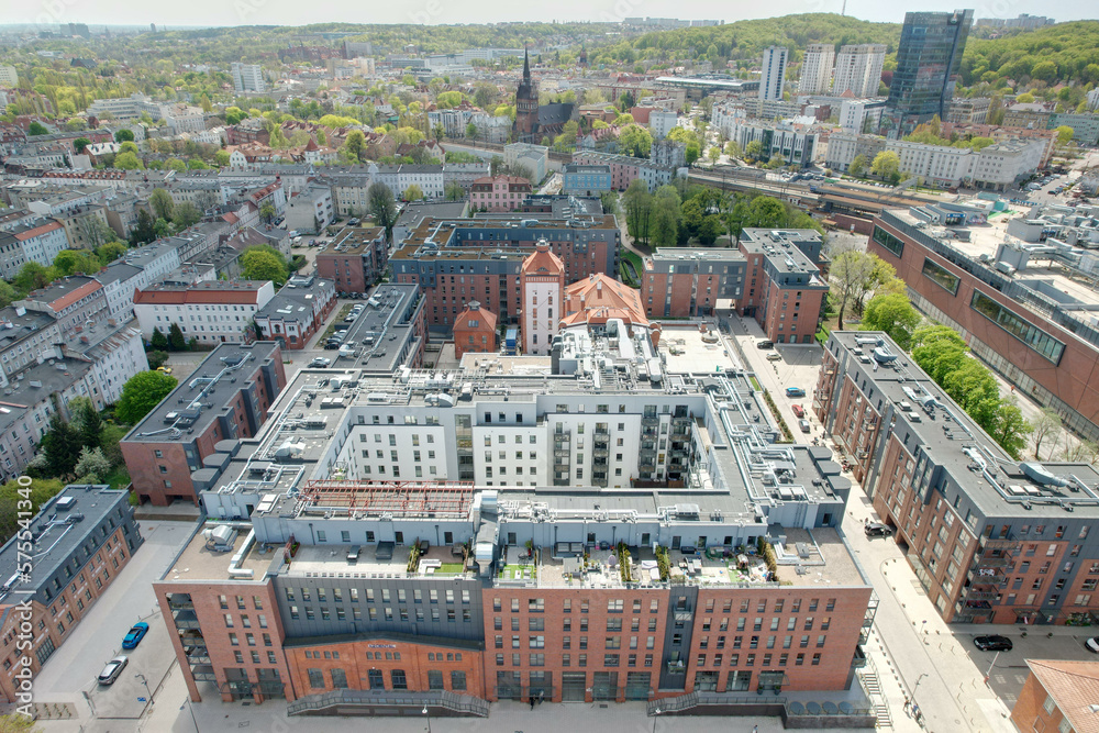A modern housing estate on the site of an old brewery in Gdańsk, shown with a drone from the air