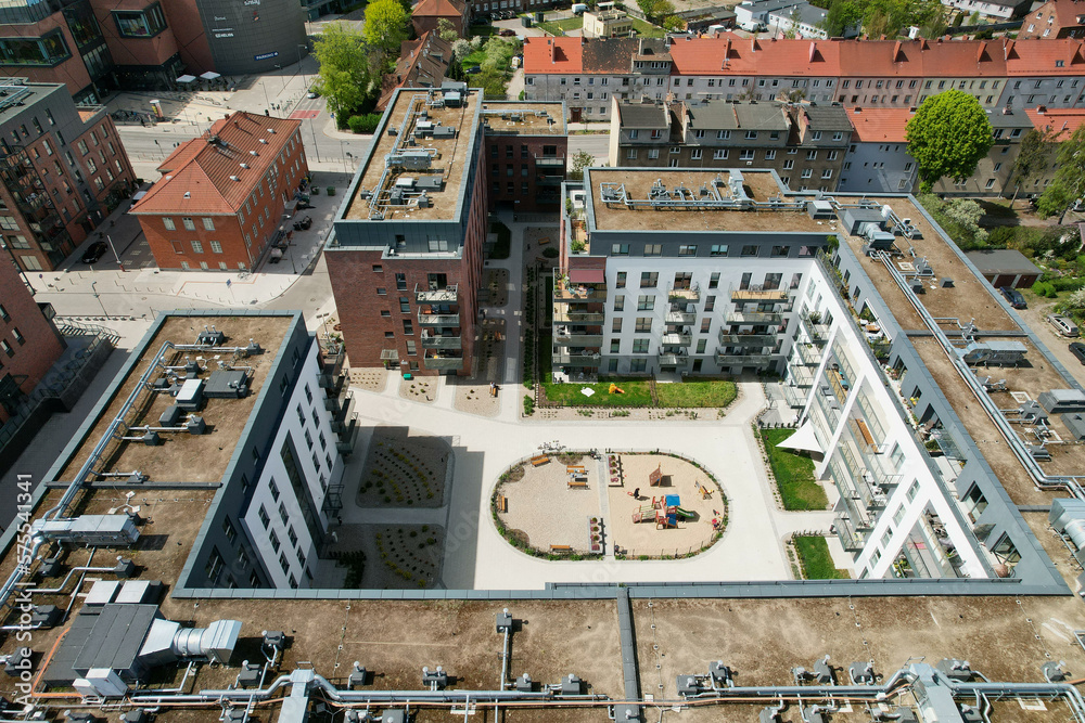 A modern housing estate on the site of an old brewery in Gdańsk, shown with a drone from the air