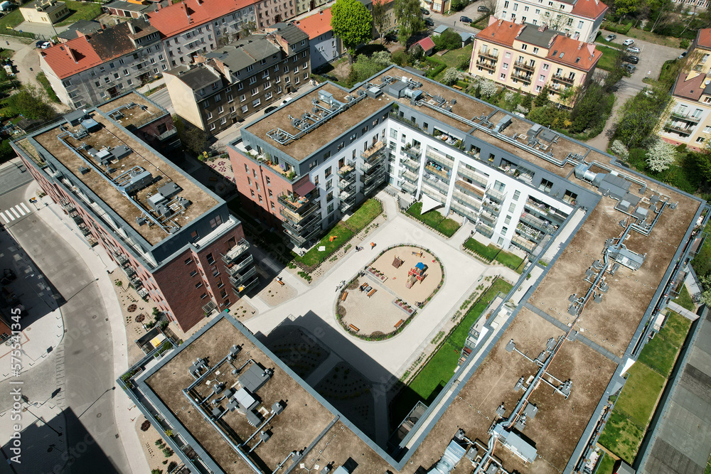 A modern housing estate on the site of an old brewery in Gdańsk, shown with a drone from the air