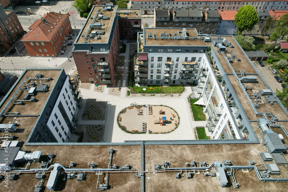 A modern housing estate on the site of an old brewery in Gdańsk, shown with a drone from the air