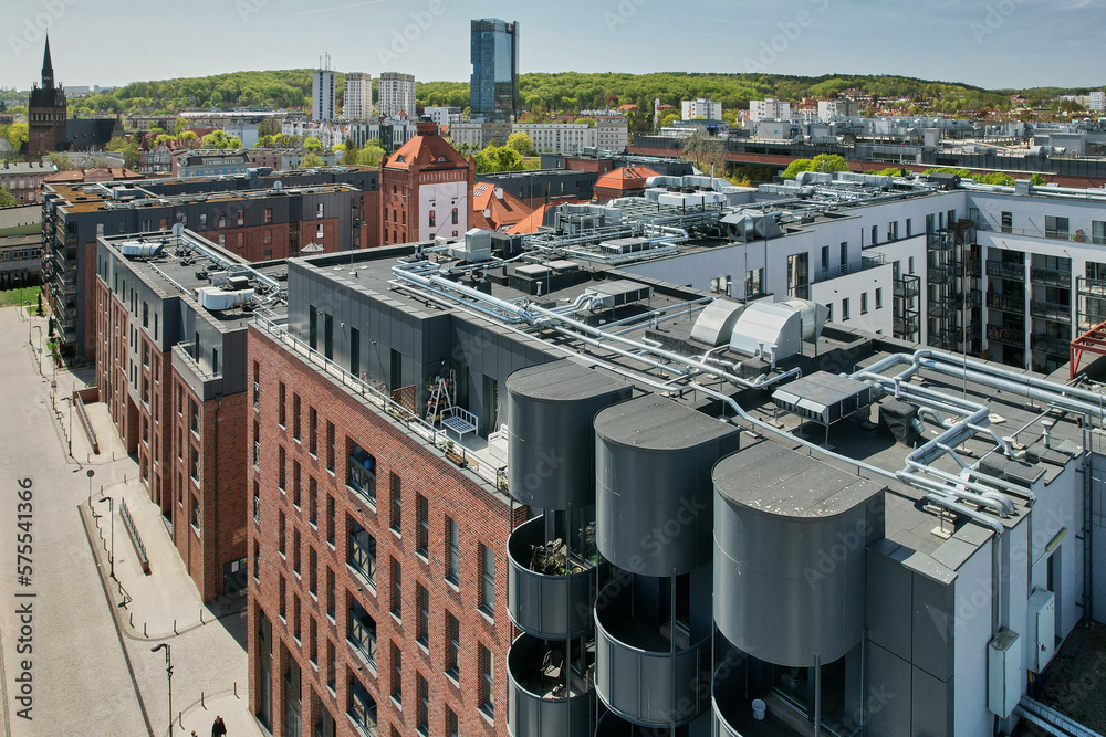A modern housing estate on the site of an old brewery in Gdańsk, shown with a drone from the air