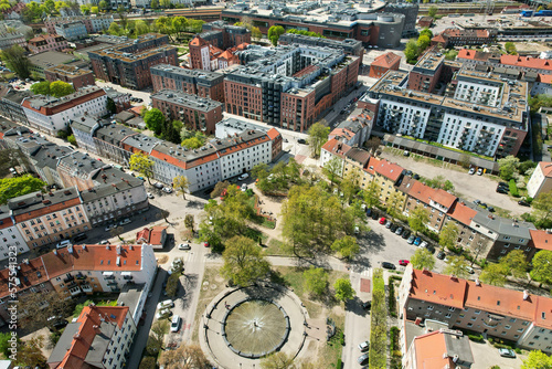 Obraz na płótnie A modern housing estate on the site of an old brewery in Gdańsk, shown with a drone from the air w salonie
