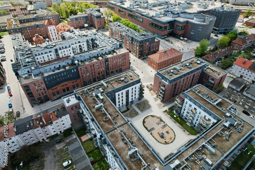 Obraz na płótnie A modern housing estate on the site of an old brewery in Gdańsk, shown with a drone from the air w salonie