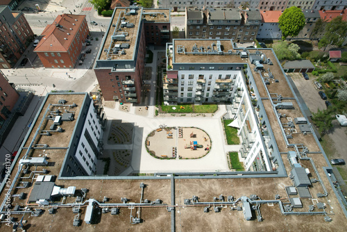 Obraz na płótnie A modern housing estate on the site of an old brewery in Gdańsk, shown with a drone from the air w salonie