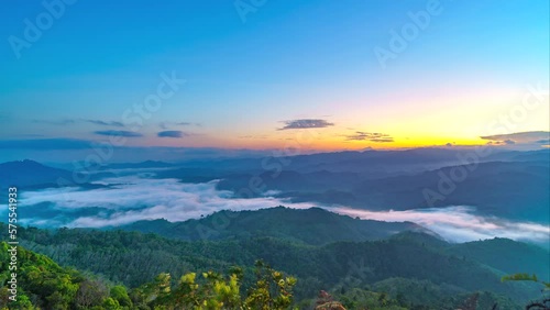 Time laps the sun rises on the mountain and the trees on the viewpoint. Travel, Beginning,  Sea of  fog and mist.