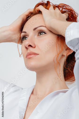 Portrait of a beautiful red-haired girl