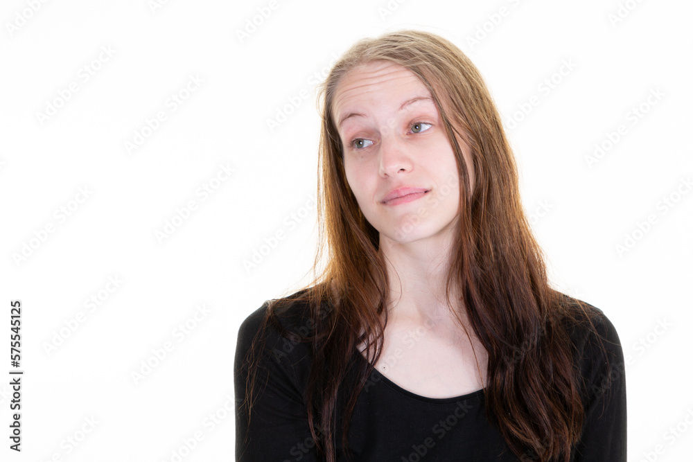 Young blonde woman isolated on white background looking down while dreaming disappointed and sadness Young blonde woman isolated on white background looking down while dreaming disappointed and sadness