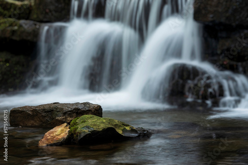 Beautiful claming landscape image of Scaleber Force waterfall in Yorkshire Dales in England during Winter morning