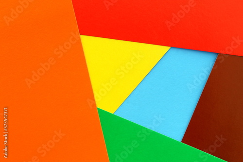 Bright abstract background from multi-colored paper cardboard.