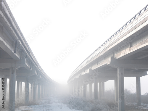 Low angle view of merging highway in fog photo