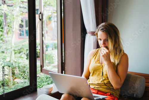 Girl working from a guest house in Cambodia
