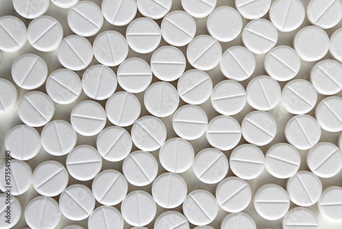 Abstract background of white pills on a white background.