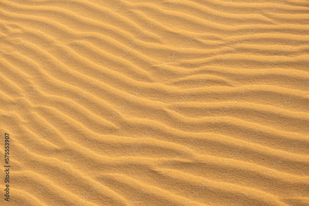 Texture, Waves of sand dune . Background texture of clean yellow sand on windy desert or beach. Texture, Waves of sand dune . Background texture of clean yellow sand on windy desert or beach.