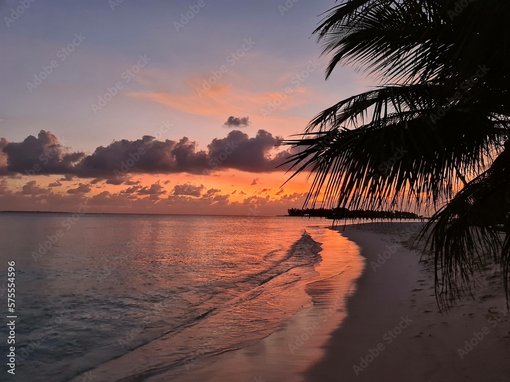 Amazing sunset in the Maldivian Islands, Indian ocean view. Paradise.