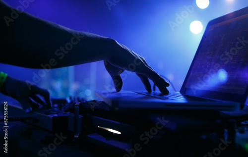 Fotografie, Tablou Club DJ playing music with laptop and midi controller