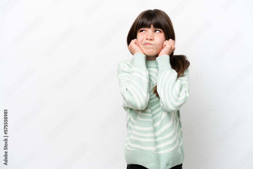 Little caucasian girl isolated on white background frustrated and covering ears Little caucasian girl isolated on white background frustrated and covering ears