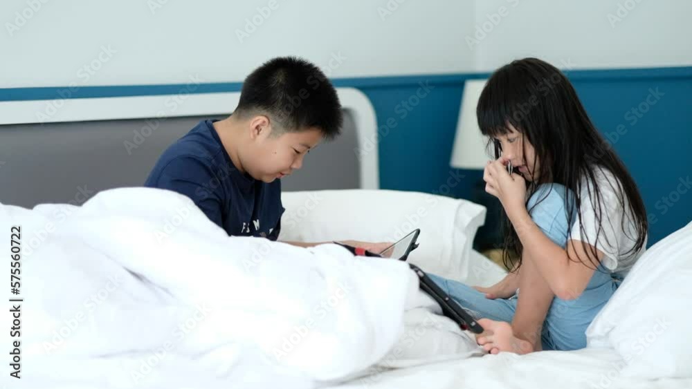 two children addicted tablet, asian kid watching cartoon
two children addicted tablet, asian kid watching cartoon