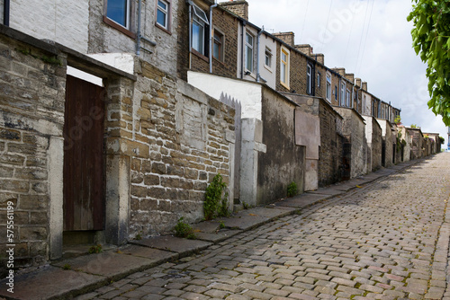 A steep terrace of traditional 19th century millworkers  cottages  back lane between Colne Lane and Basil Street  Colne  Lancashire  UK