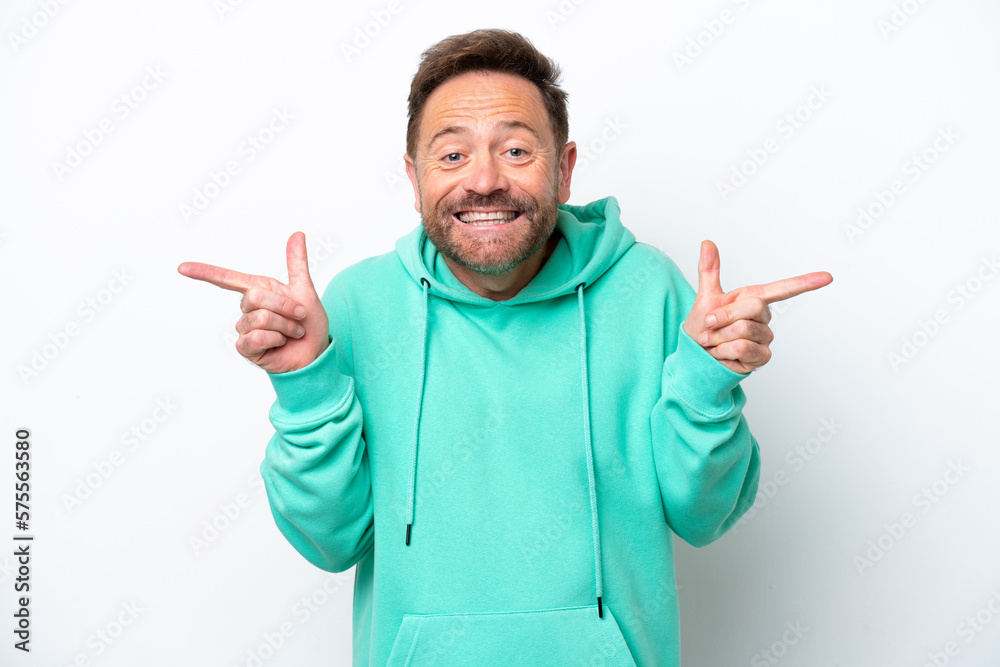 Middle age caucasian man isolated on white background pointing finger to the laterals and happy Middle age caucasian man isolated on white background pointing finger to the laterals and happy