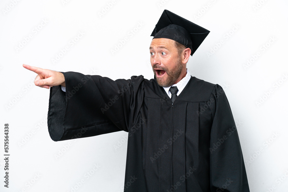 Middle age university graduate man isolated on white background pointing away Middle age university graduate man isolated on white background pointing away
