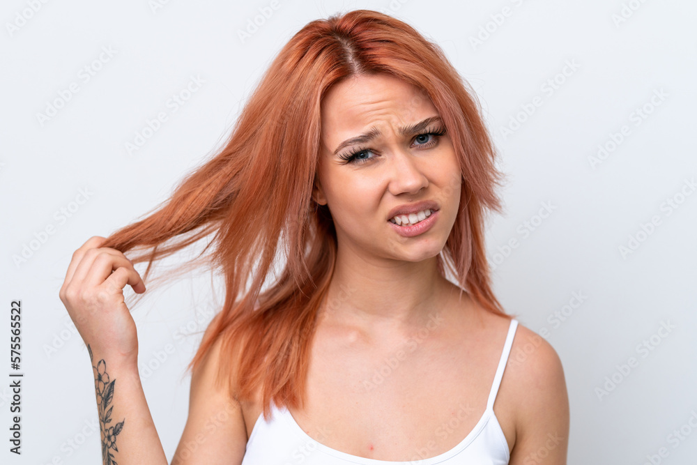 Young Russian girl isolated on white background with tangled hair. Close up portrait Young Russian girl isolated on white background with tangled hair. Close up portrait