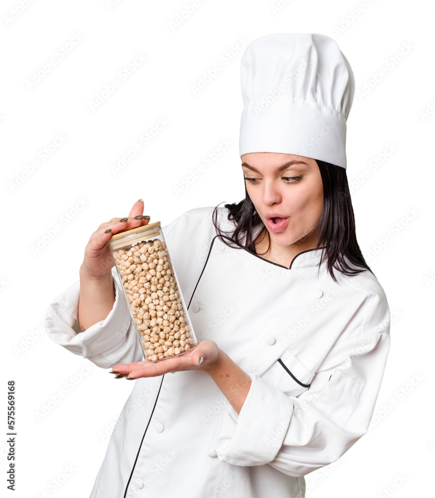 Young cook woman holding chickpeas isolated Young cook woman holding chickpeas isolated