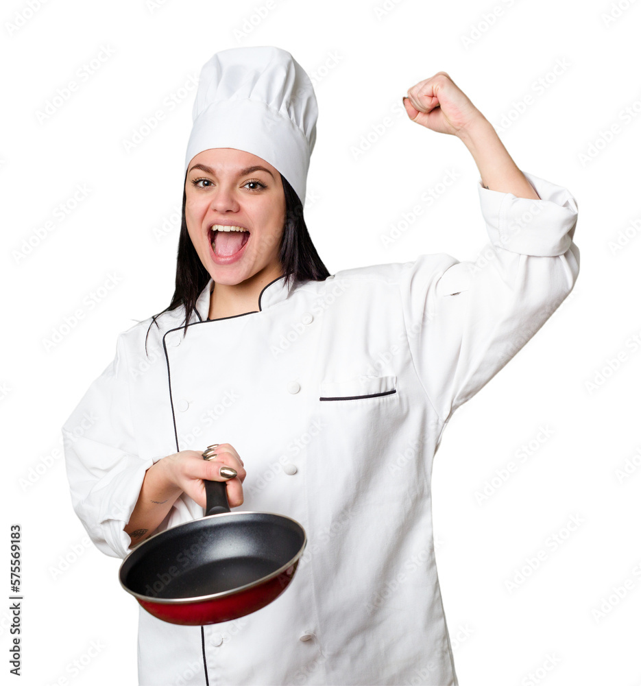 Young cook woman holding a frying pan isolated Young cook woman holding a frying pan isolated