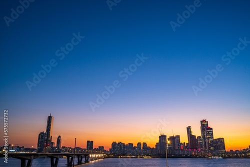 Cityscape night view of Yeouido, Seoul at sunset time © SEUNGJIN