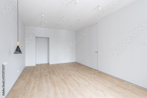 Empty gray room ready for people to move in