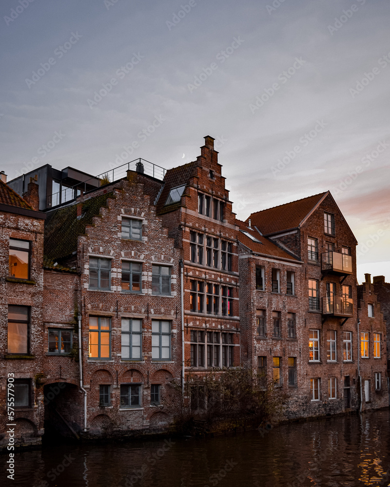 Canal houses in Ghent, Belgium during sunset