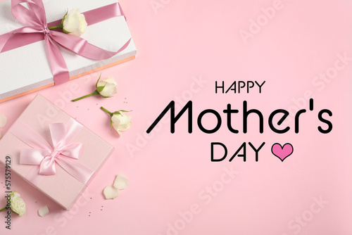 Happy Mother's Day. Greeting card with gift boxes and beautiful flowers on pink background, flat lay © New Africa