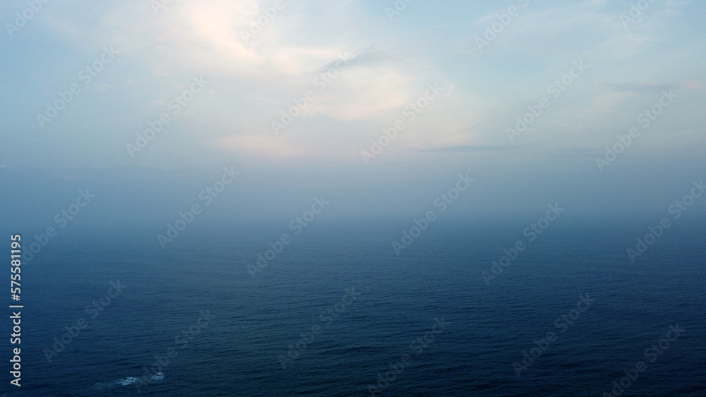 Fototapeta premium Aerial view of the sea background. Beautiful ocean surface pattern for design and advertising