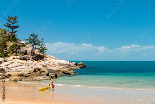 Calm surf and Lifeguard on empty beach at Magnetic island, Australia © Thomas