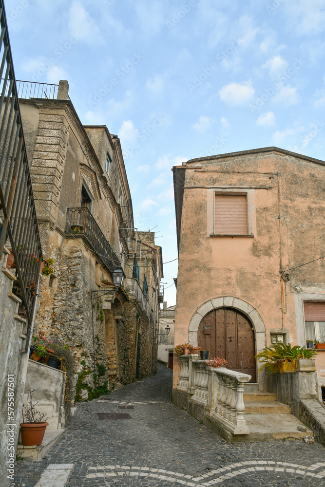 A narrow street among the old houses of Pietravairano, a rural town in the province of Caserta, Italy.