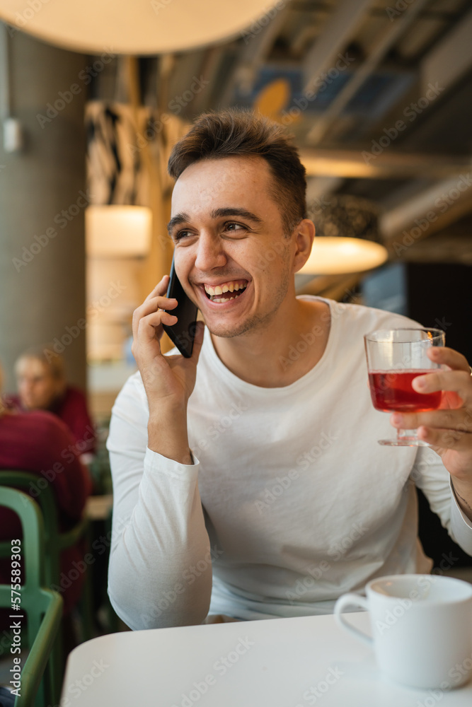 one man young adult caucasian using mobile phone smartphone