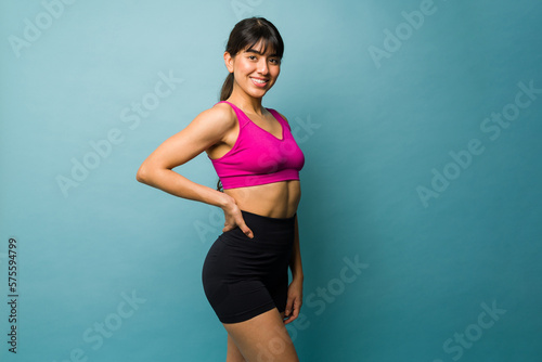 Hispanic beautiful strong woman with an athletic body