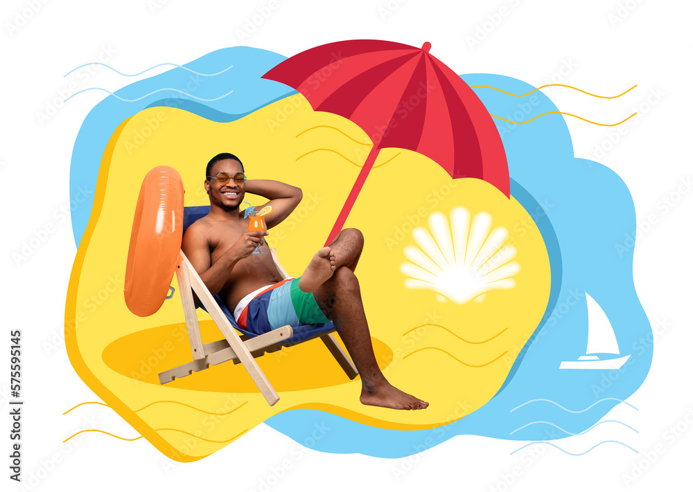 Happy millennial black guy in glasses and shorts drinking tropical cocktail in lounge chair, chilling