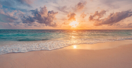 Closeup sea sand beach. Beautiful beach landscape. Inspire tropical beach seascape horizon. Dreamy sunset sky calm tranquil relax sunrise summer mood. Positive energy meditation summer tropical island