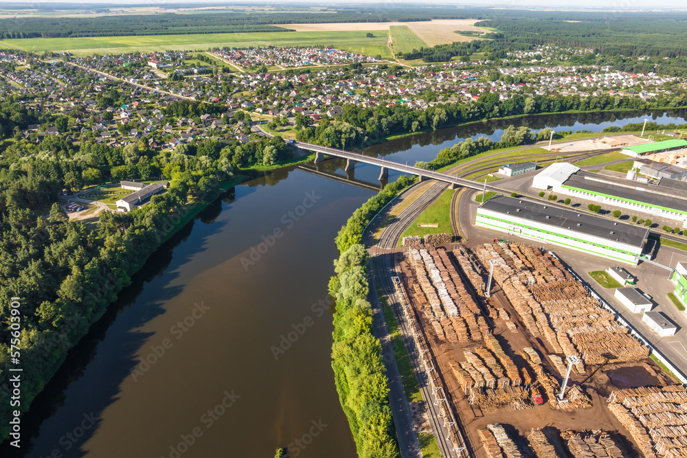 aerial view of huge bridge between two banks and urban areas