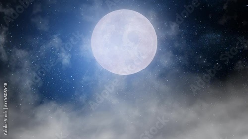 4K.Full moon on dark cloudy night. Clouds passing by the moon . photo