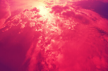 Acrylglasbilder Pantone 2023 Viva Magenta Beautiful cloudy sky at sunset. Viva magenta trendy color. Sky texture. Abstract nature background  © vvvita