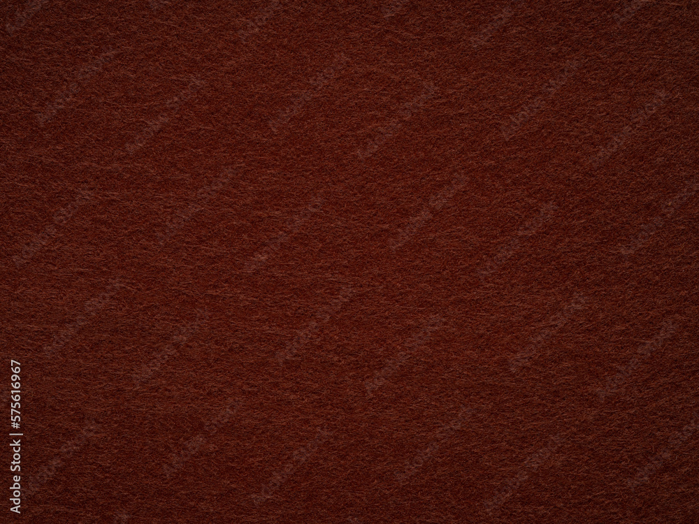 Brown felt fabric material texture. Full frame large matt backdrop wallpaper. Matt retro velvet pattern or vintage background in high resolution. Natural wool for text, lettering, patchworkor 3d art.