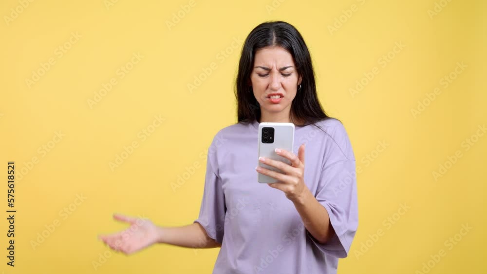 Worried caucasian woman using a mobile phone