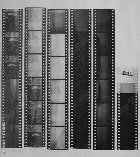 long blank 35mm black and white film strips printed on white copy paper with empty frames.