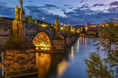 Photography Evening vew on the medieval  Charles bridge that crosses the Vltava river in Prague during summer, Praque, Czech Republik