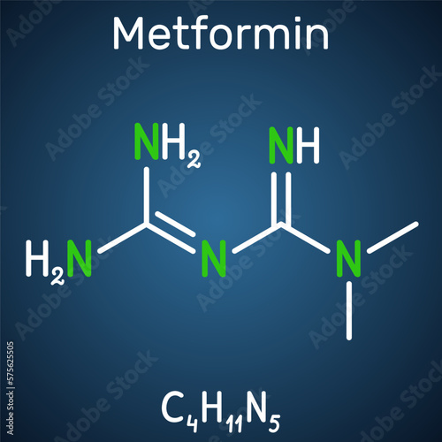 Metformin molecule. It is biguanide antihyperglycemic agent  used in management of type II diabetes. Structural chemical formula on the dark blue background. photo