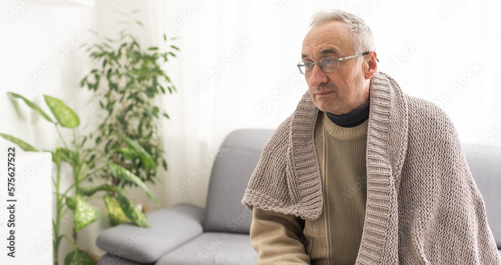 close-up portrait of a senior man thinking about something.