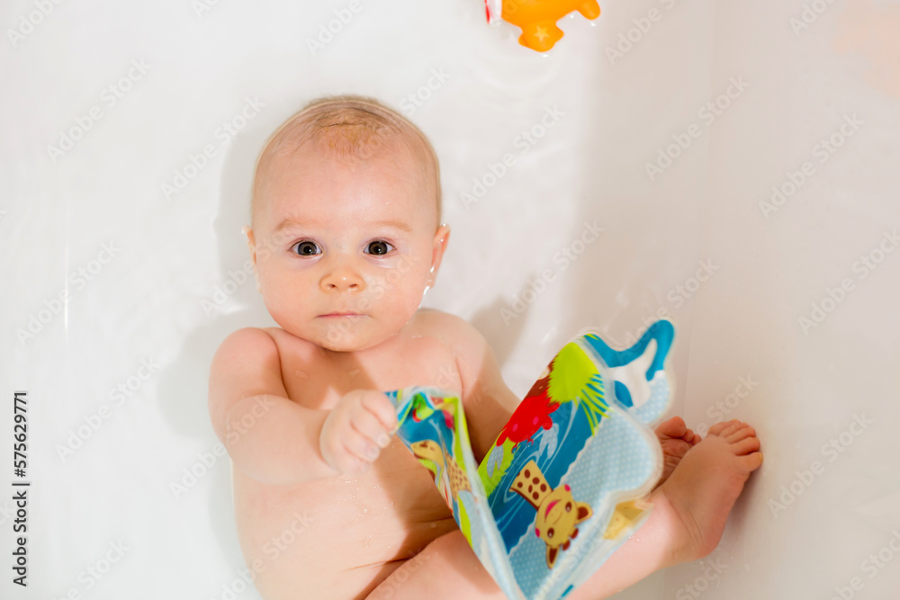 Little baby boy, having a bath at home, having fun playing Little baby boy, having a bath at home, having fun playing