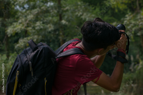 Young Indian Photographer With His Professional Dslr Camera. Photographer And Camera Image.